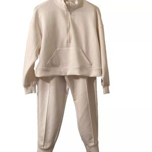 Women’s Ivory Tracksuit.  Size Large